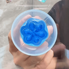 Animated demonstration of a flower toilet gel stamp